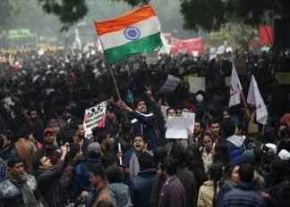 अल्पसंख्यक आयोग ने दिल्ली दंगों का भाजपा का ज़िम्मेदार ठहराया